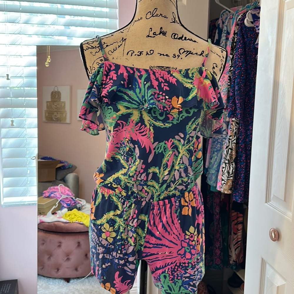 Xs romper a little worn